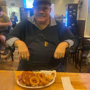 a man cutting a plate of food