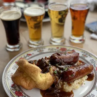 a plate of food and beer