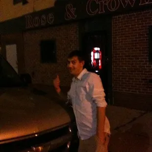a man standing in front of a truck
