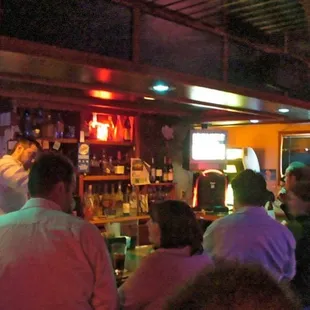 people sitting at the bar