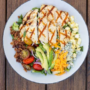 a white plate with a chicken salad