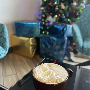 sipping a gingerbread latte in the cute and festive dining room