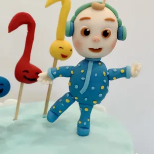 a cake decorated with a cartoon character