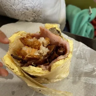 Breakfast burrito.  So delicious and crispy bacon &amp; hash brown.