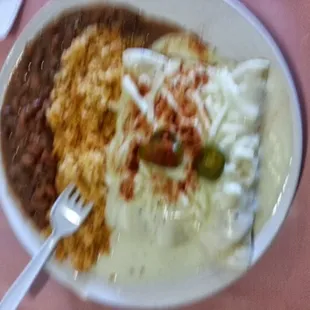 Sour Cream chicken enchiladas with Mexican rice and beans!