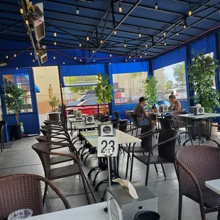 Outdoor seating in a covered tent