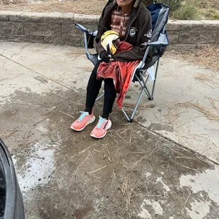 The person who got drenched by the host ! And the fire pit which is on concrete!