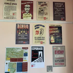 a collection of posters on a wall