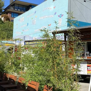 a food truck parked in front of a restaurant