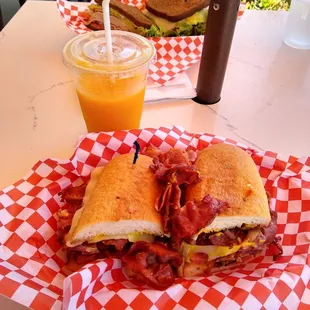 Hot pastrami and turkey avocado sandwiches and freshly squeezed OJ