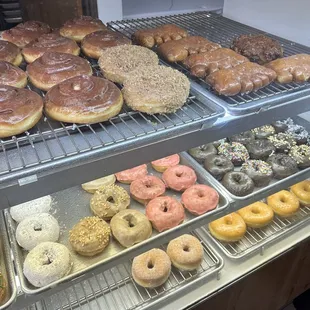 a variety of doughnuts on display