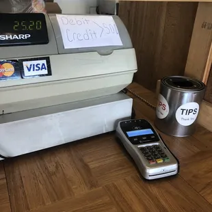 a cash register and a mobile phone