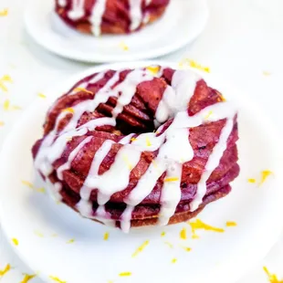 a close up of a donut on a plate