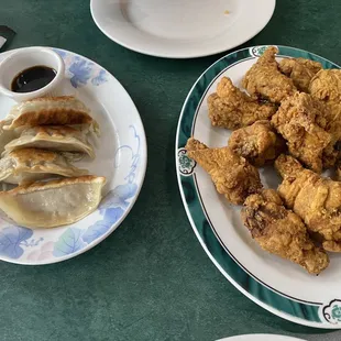 Potstickers and Deep Fried Chicken Wings off the appetizer menu.