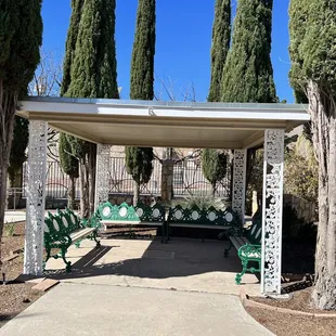 A calm and inviting pergola/patio to sit and relax at