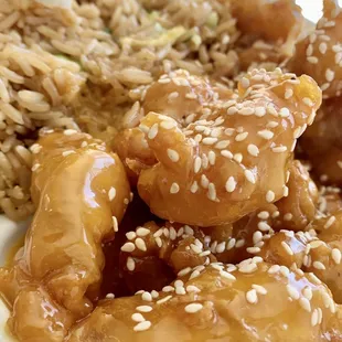 Sesame chicken with amazing fried rice [cream cheese wonton not pictured] for only $9 between 11 am-3 pm!