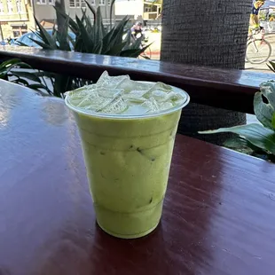 Iced matcha latte with oat milk