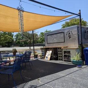 outdoor seating area with awning