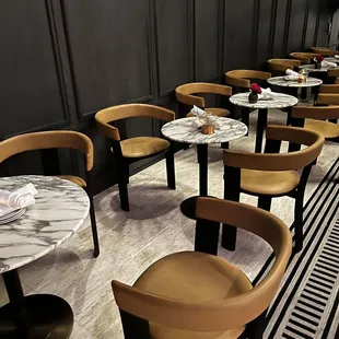 tables and chairs in a restaurant