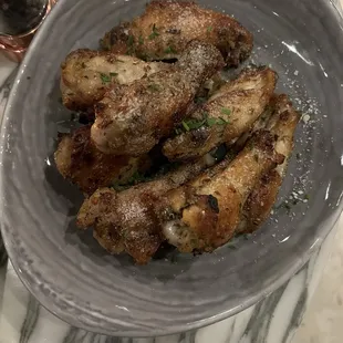 Parmesan chicken wings very good but they can use a bit of a kick.