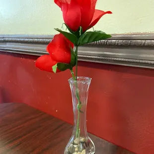 Stop and smell the roses.