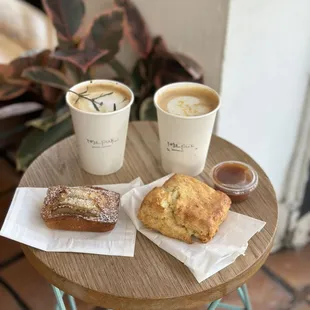 Buttered biscuit with strawberry jam.
