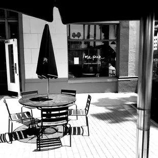 a table and chairs outside