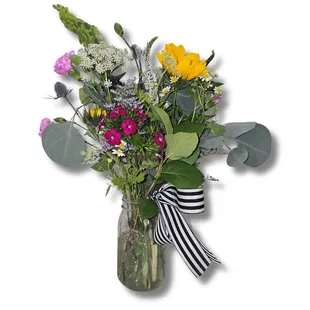Farmers Market Jar, a designers choice arrangement of farm fresh flowers in a classic mason jar with our signature striped bow.