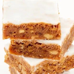 a stack of four pieces of cake