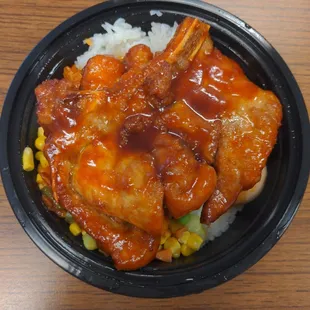 a bowl of chicken and rice