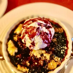 Blueberry cobbler with scoop of ice cream ala mode