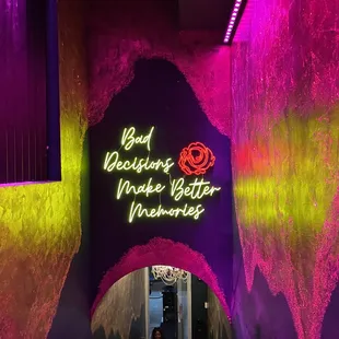 the neon sign for the restaurant