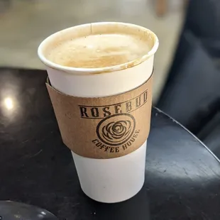 a cup of coffee on a table