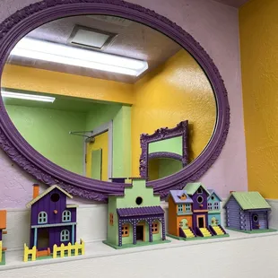 Mom painted these cute houses in the bathroom.