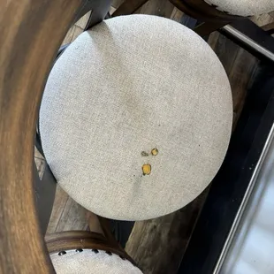 Cigarette buds and holes on chairs