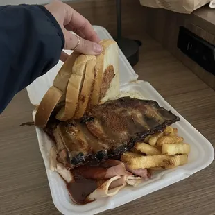Ribs, fries, sliced meats