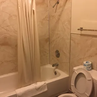 Adequate bathroom with sink vanity outside