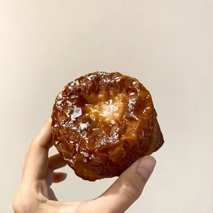 Kouign-Amann, a buttery flakey pastry with a crispy caramel-like coating