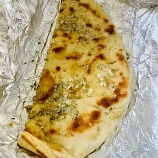 Rosemary garlic bread, like naan, Made fresh... it was still soft and hot when I sat down to eat, so good!