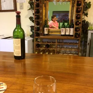 a glass of wine on a table