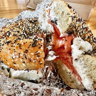 a bagel with bacon and cheese