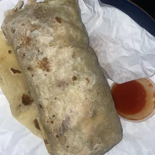 Surf and turf burrito (4 bites in) look how fat she is!!