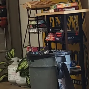 a surfboard leaning against a shelf