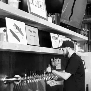 a man pouring wine