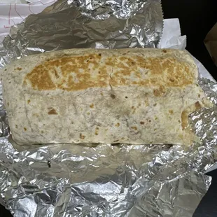 This is a Chicago chicken burrito. It is large and in charge!!!