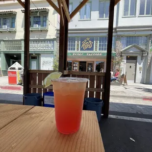 Hibiscus Shandy in front of the taproom
