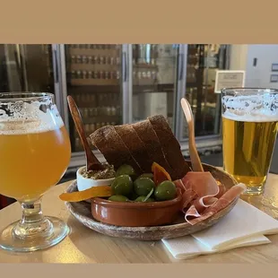Flower power, Pilsner, bread and butter, olives, prosciutto