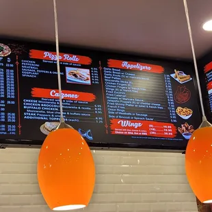 the menu and prices on the wall