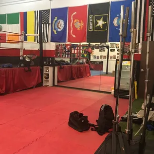 Next to the entrance to main area.