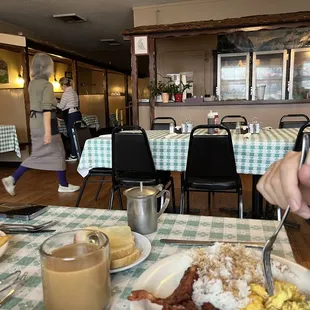a woman eating breakfast